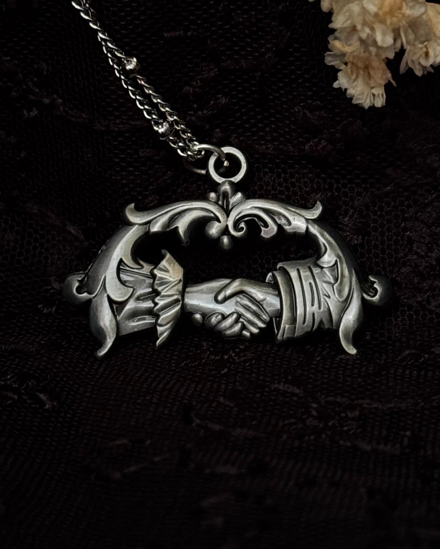 Carved in Stone- Clasping Hands