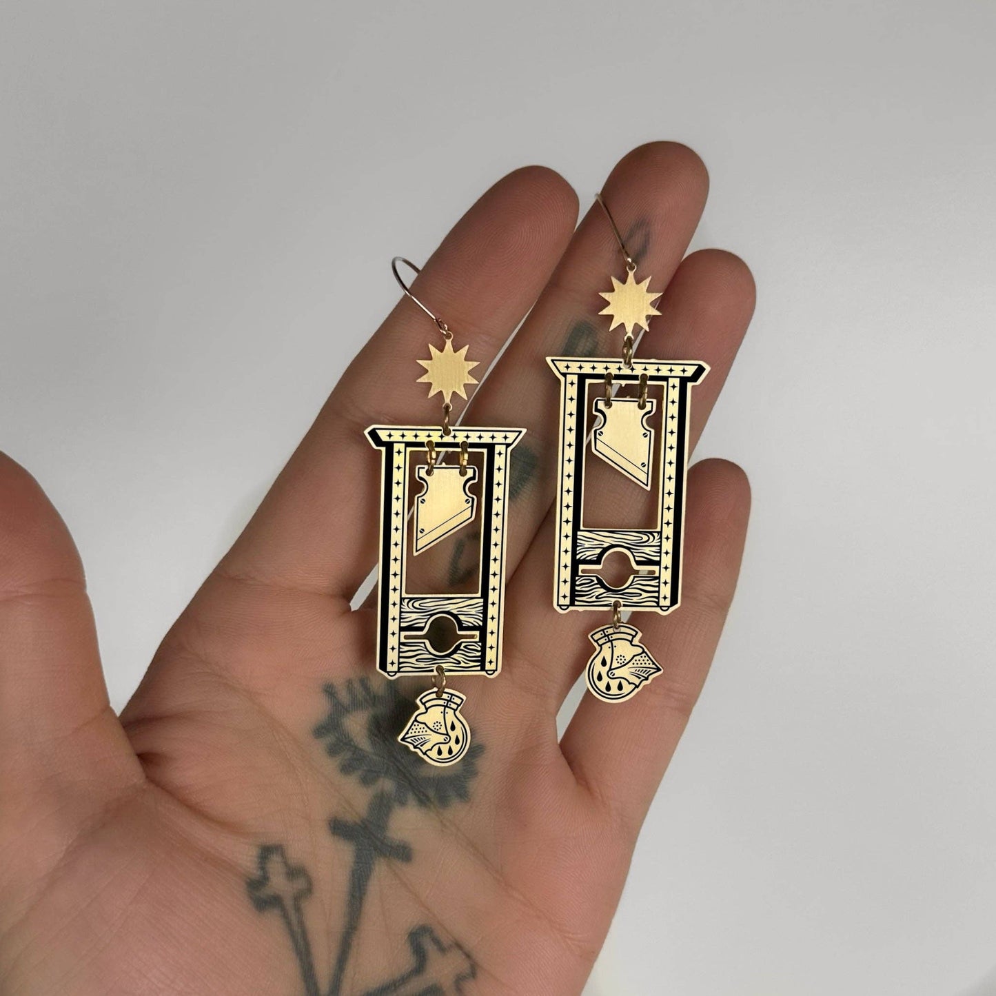 The Guillotine Earrings by While Odin Sleeps