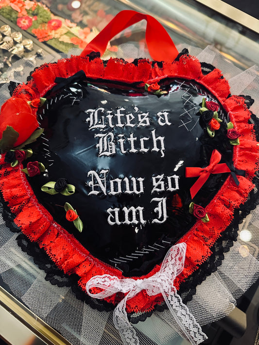 Life’s a Bitch Wall Heart by Dirty Pillows