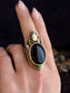 Brass Moon Phase Shield Ring with Black Onyx by Acid Queen